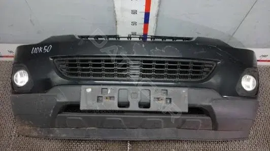Передний бампер UOK50G501