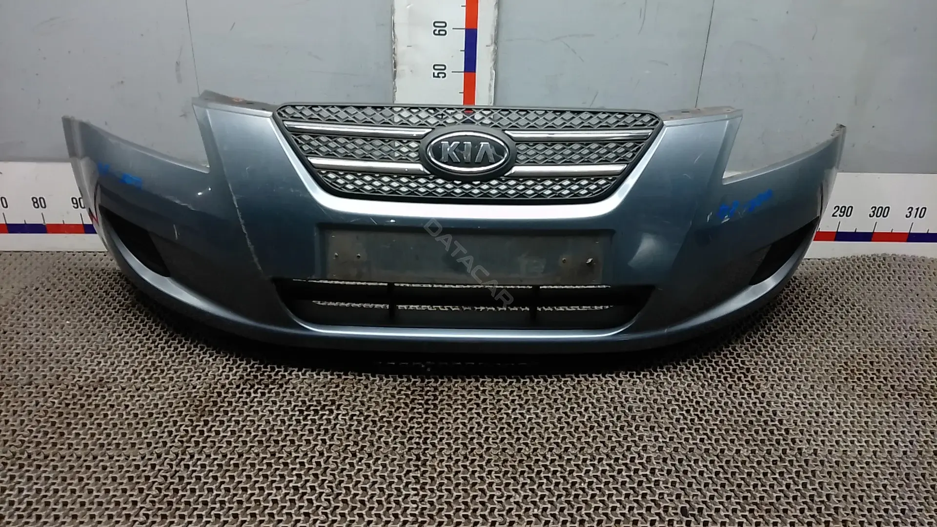 Передний бампер WOK84G501