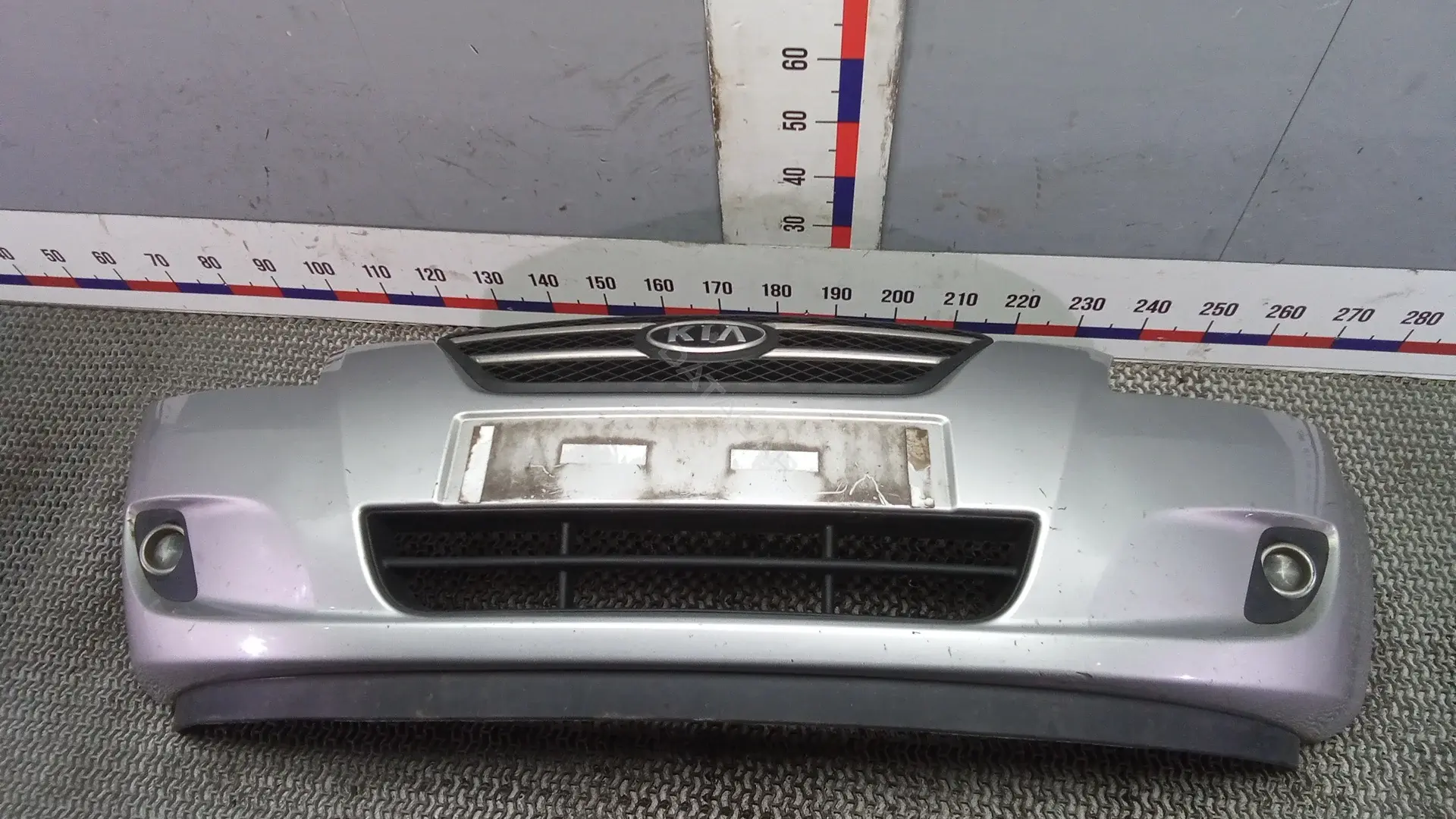 Передний бампер NOK19G501