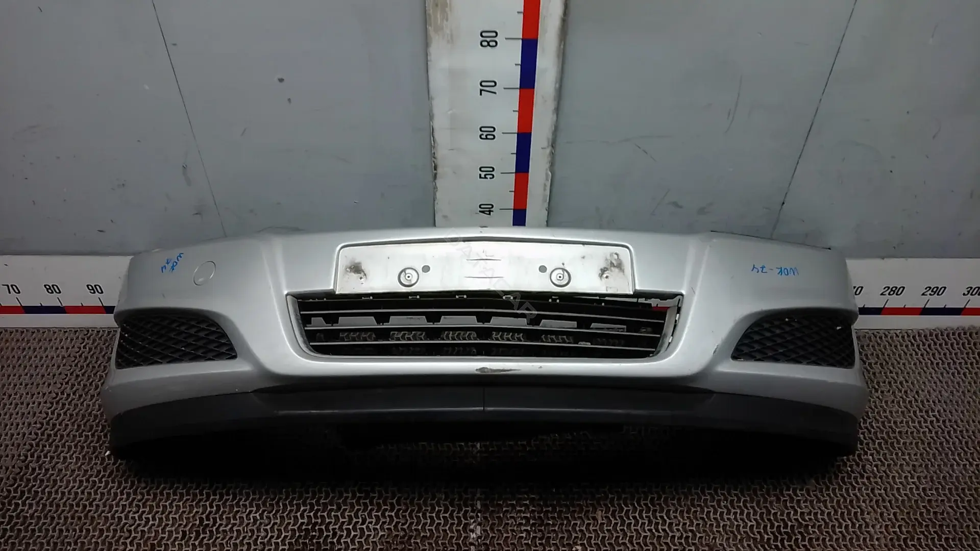 Передний бампер WOK74G501