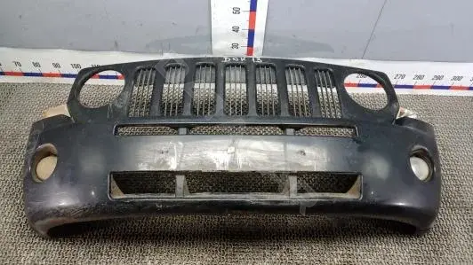 Передний бампер DOK13G501