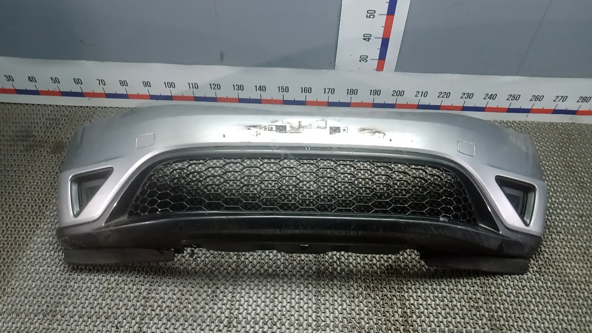 Передний бампер EOK27G501