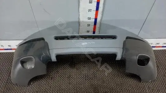 Передний бампер EOK12G501