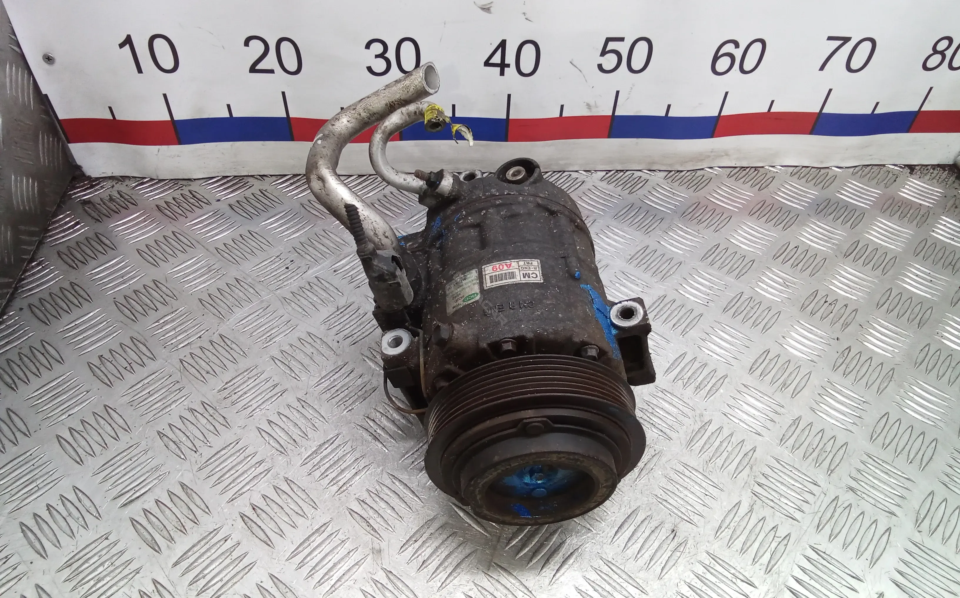 Компрессор кондиционера 977012B700