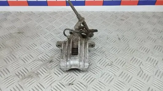 Суппорт тормозной 1K0615424J