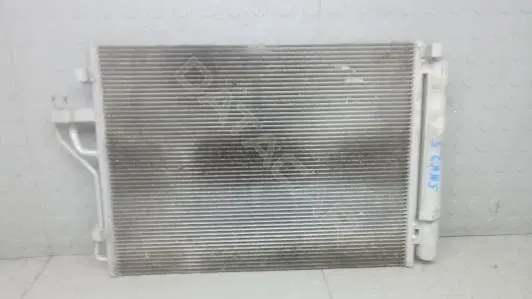 Радиатор кондиционера 976062Y000