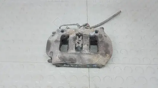 Суппорт тормозной 7P6615424D