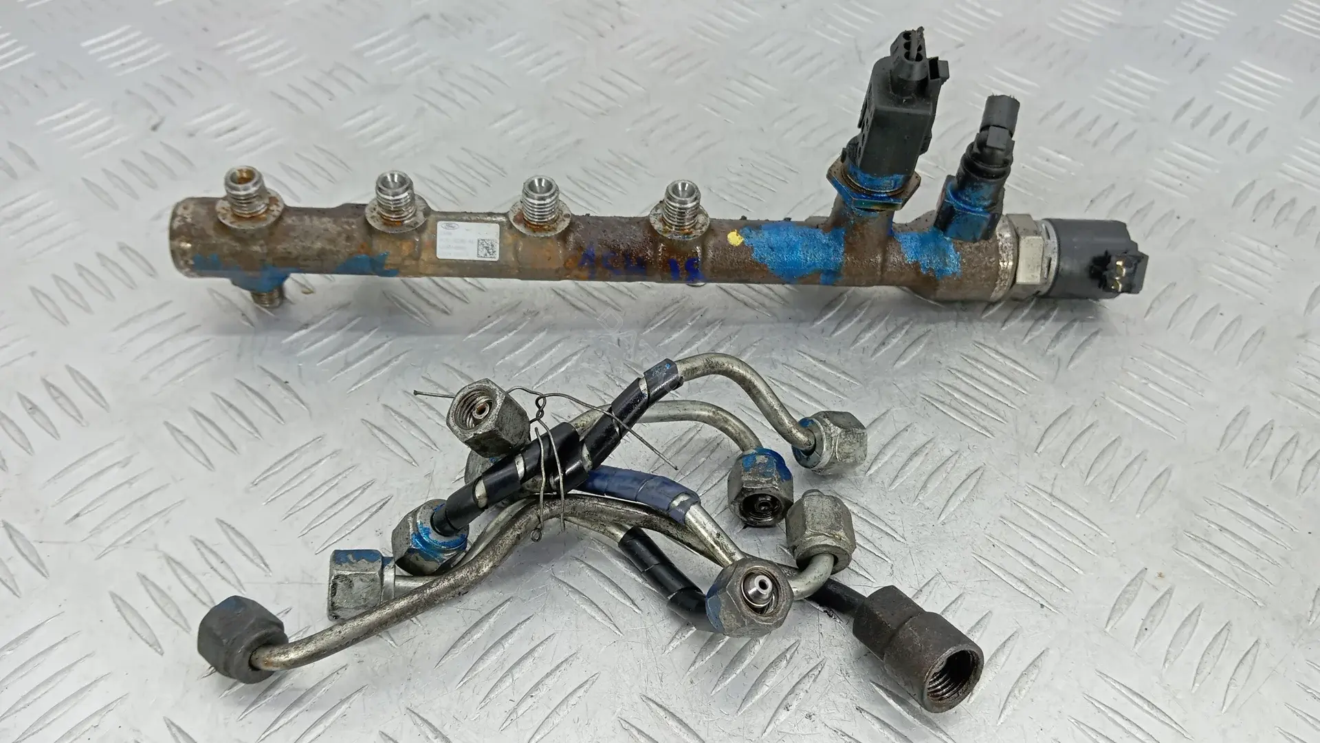 Топливная рейка CK2Q-9D280-AA