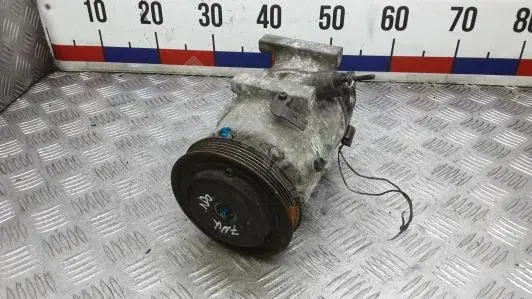 Компрессор кондиционера 977012T000