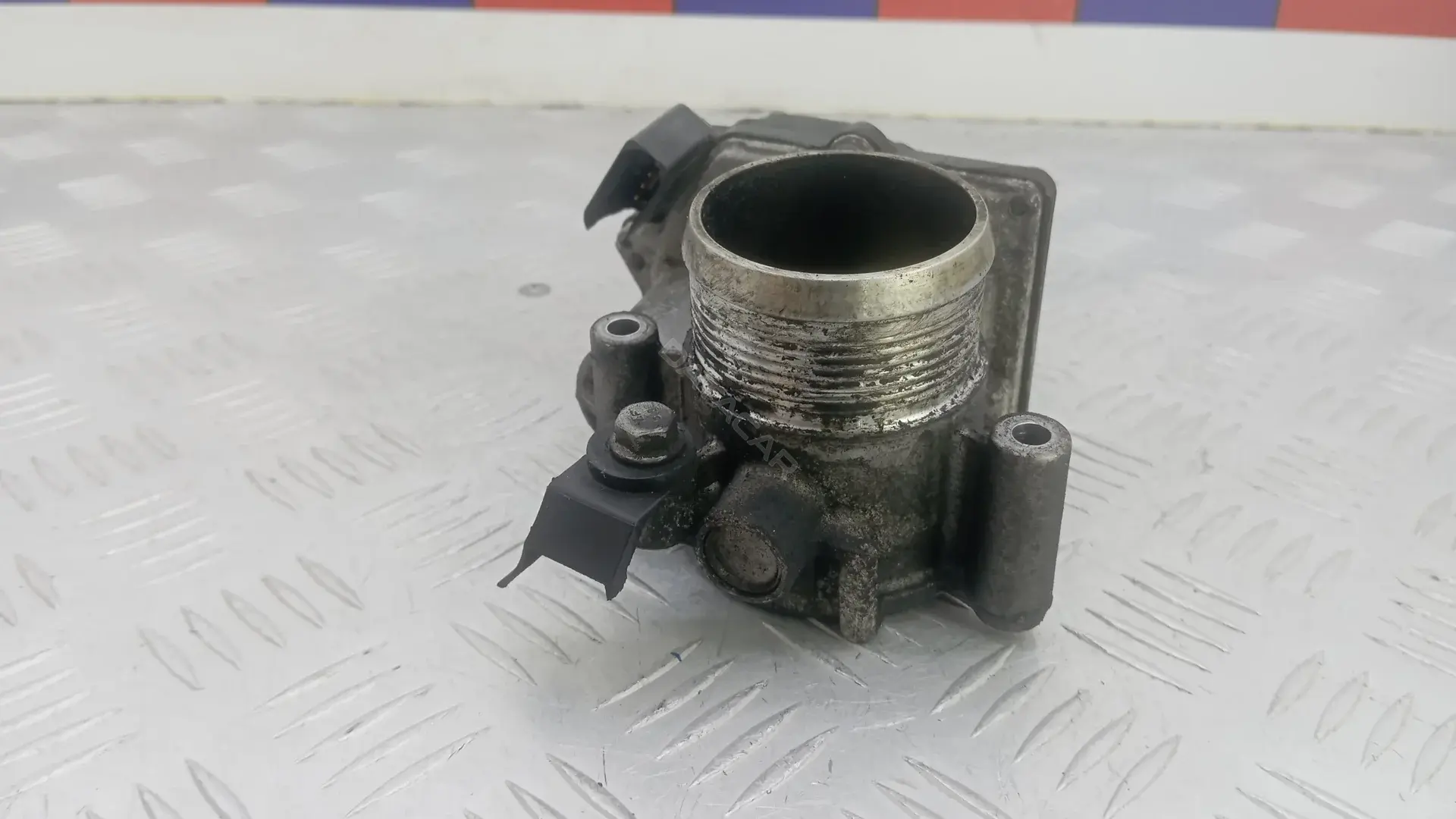 Дроссельная заслонка 03L128063AC V100