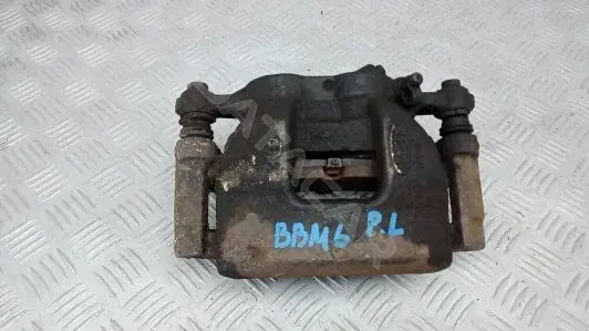 Суппорт тормозной BBM06K701