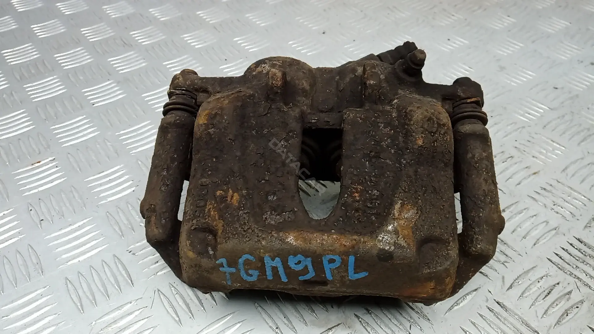 Суппорт тормозной 7GM09K701