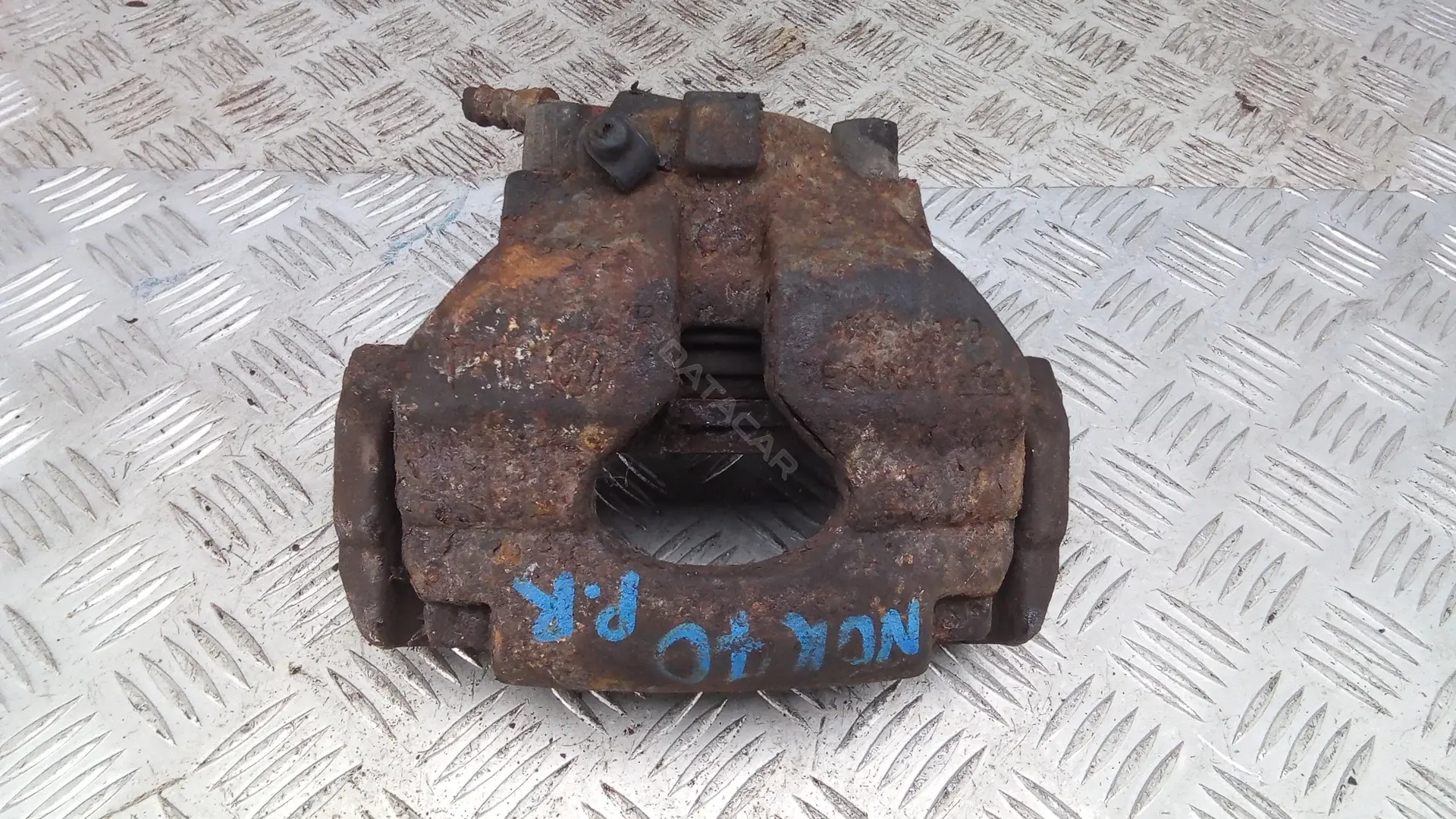 Суппорт тормозной NOK70N701