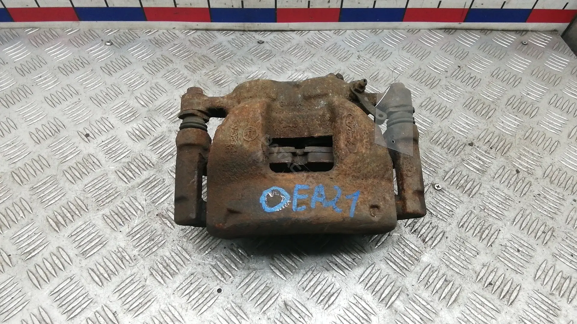 Суппорт тормозной OEA21K701
