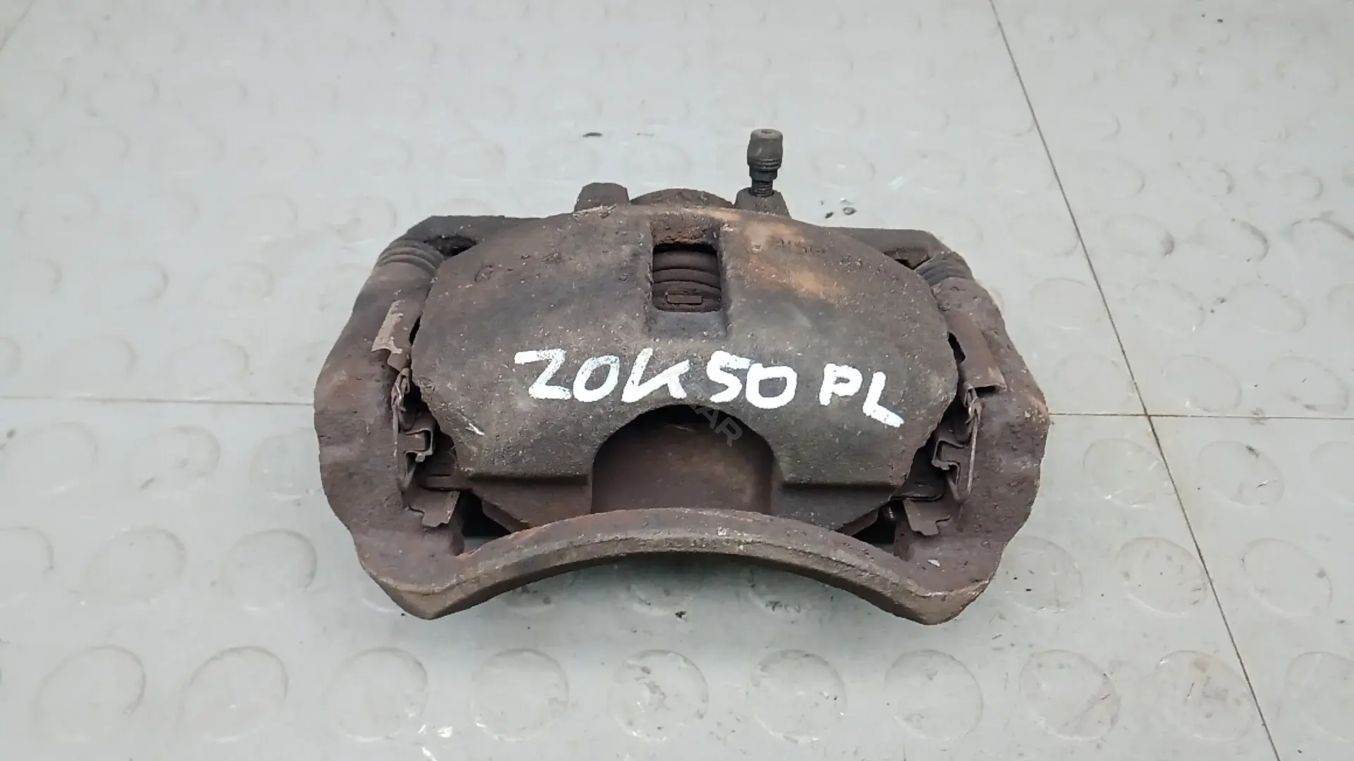 Суппорт тормозной ZOK50PJ01