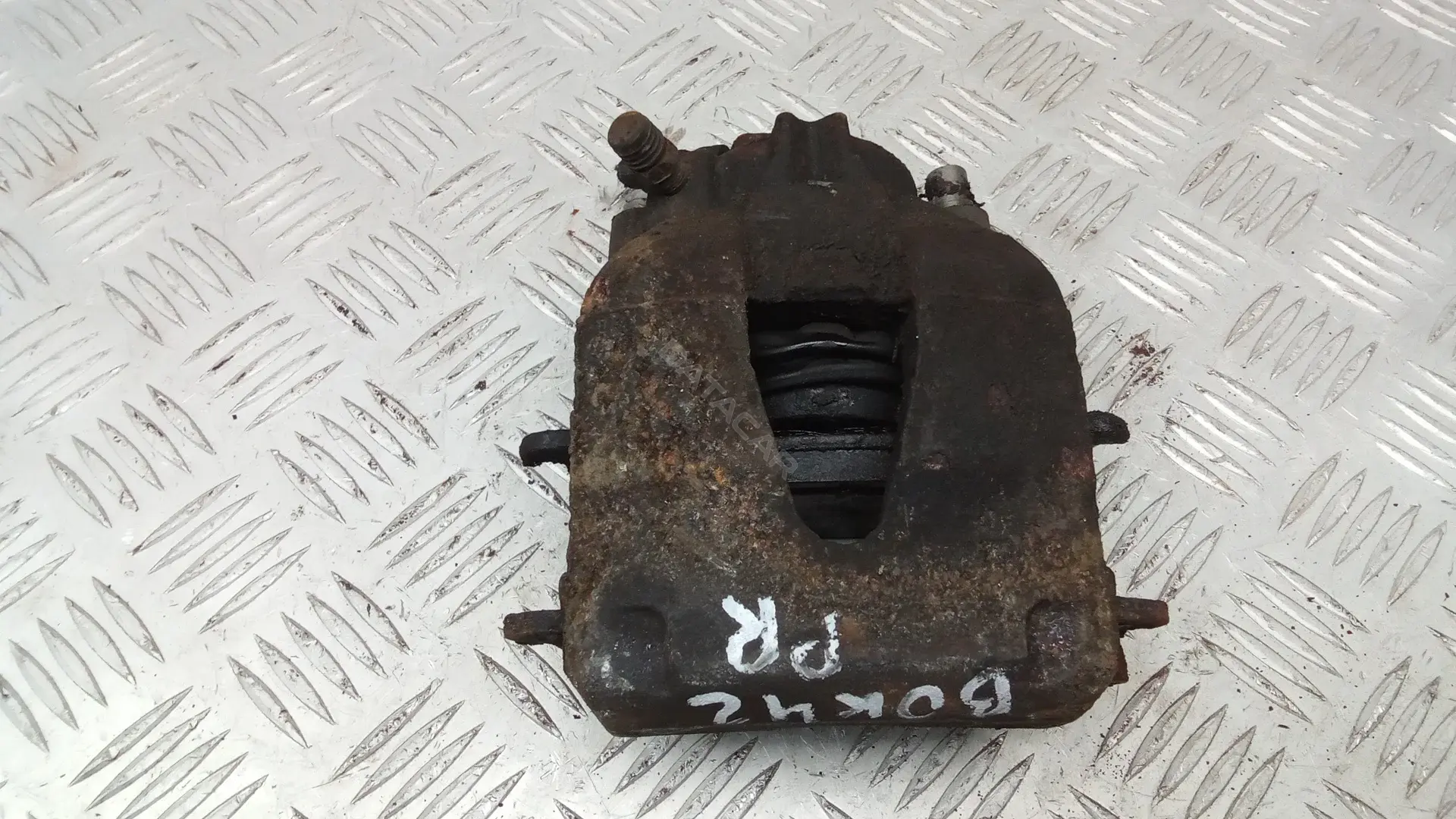 Суппорт тормозной 6C0615124