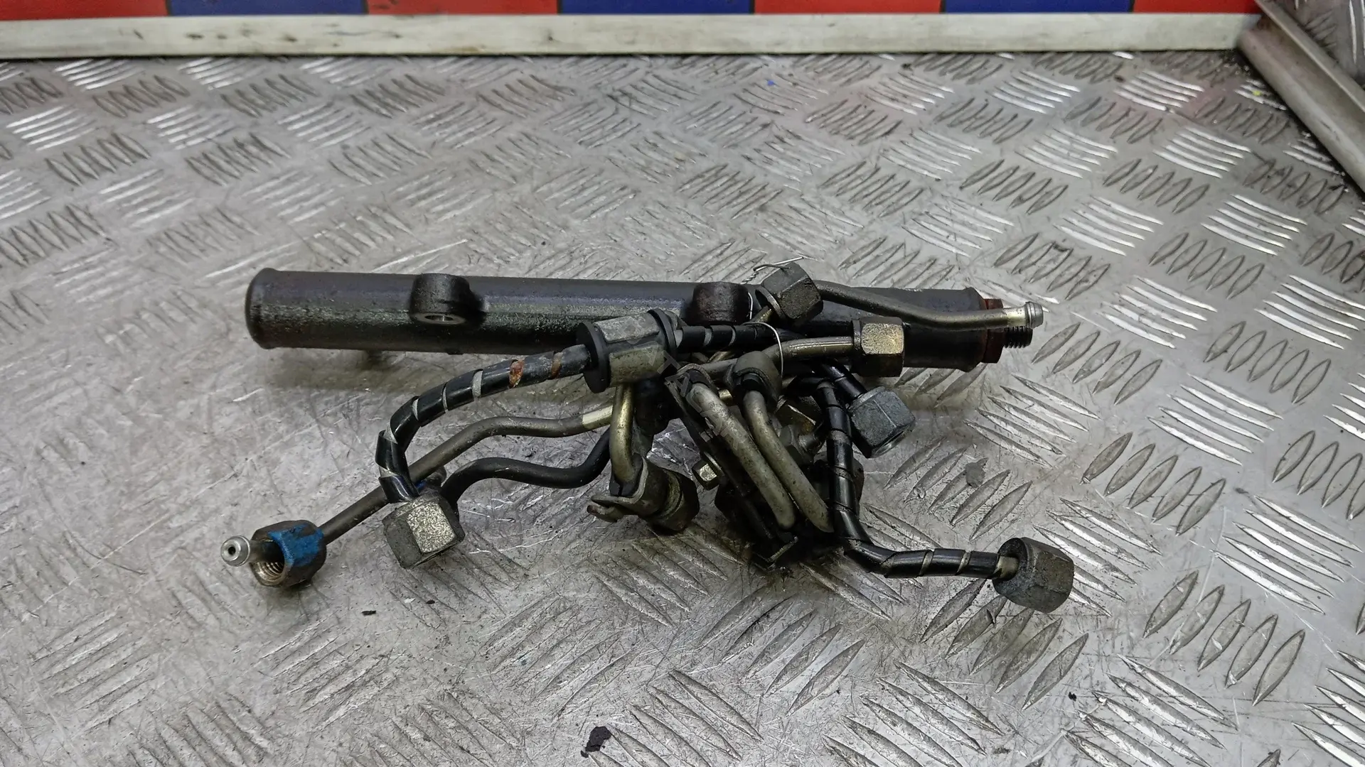 Топливная рейка 4R8Q-9D280-BC