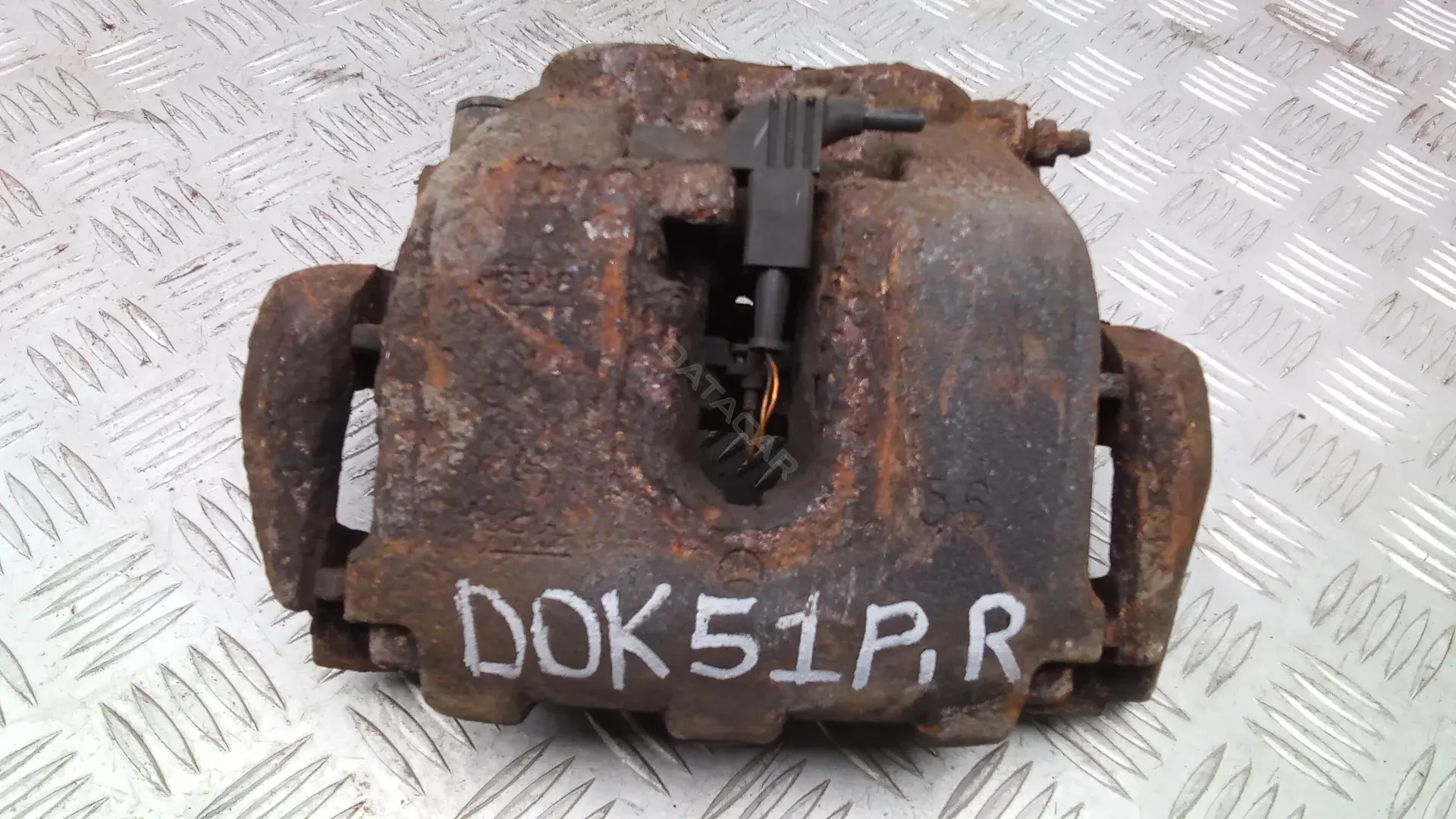Суппорт тормозной DOK51N701