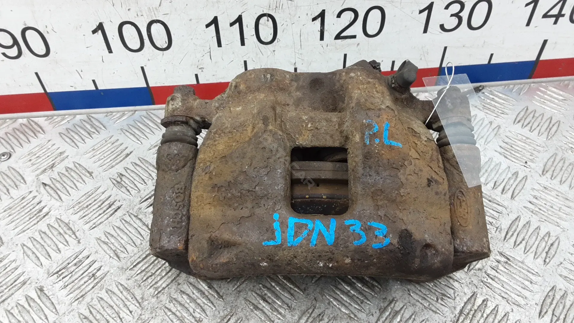 Суппорт тормозной JDN33K701