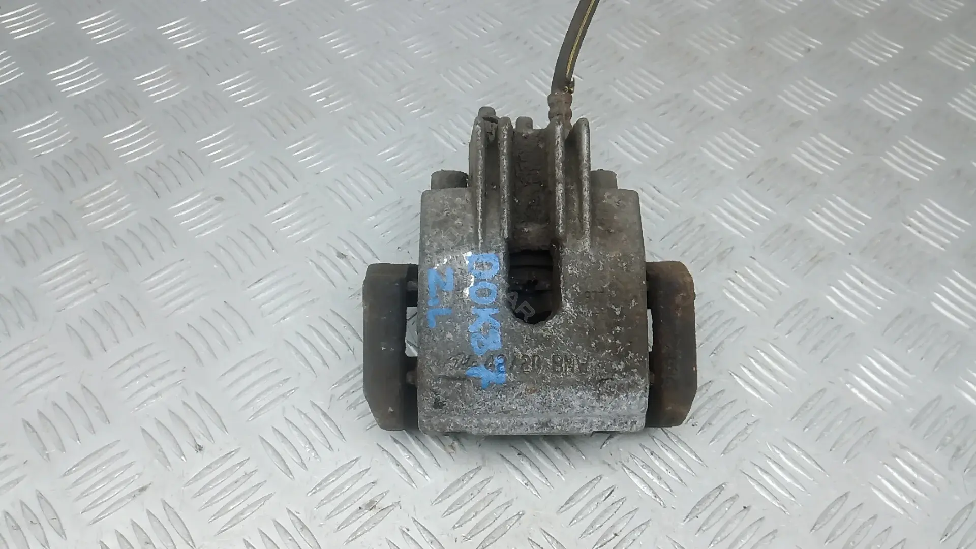 Суппорт тормозной DOK87MA01