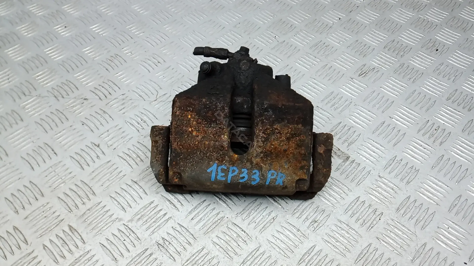 Суппорт тормозной 1K0615124E