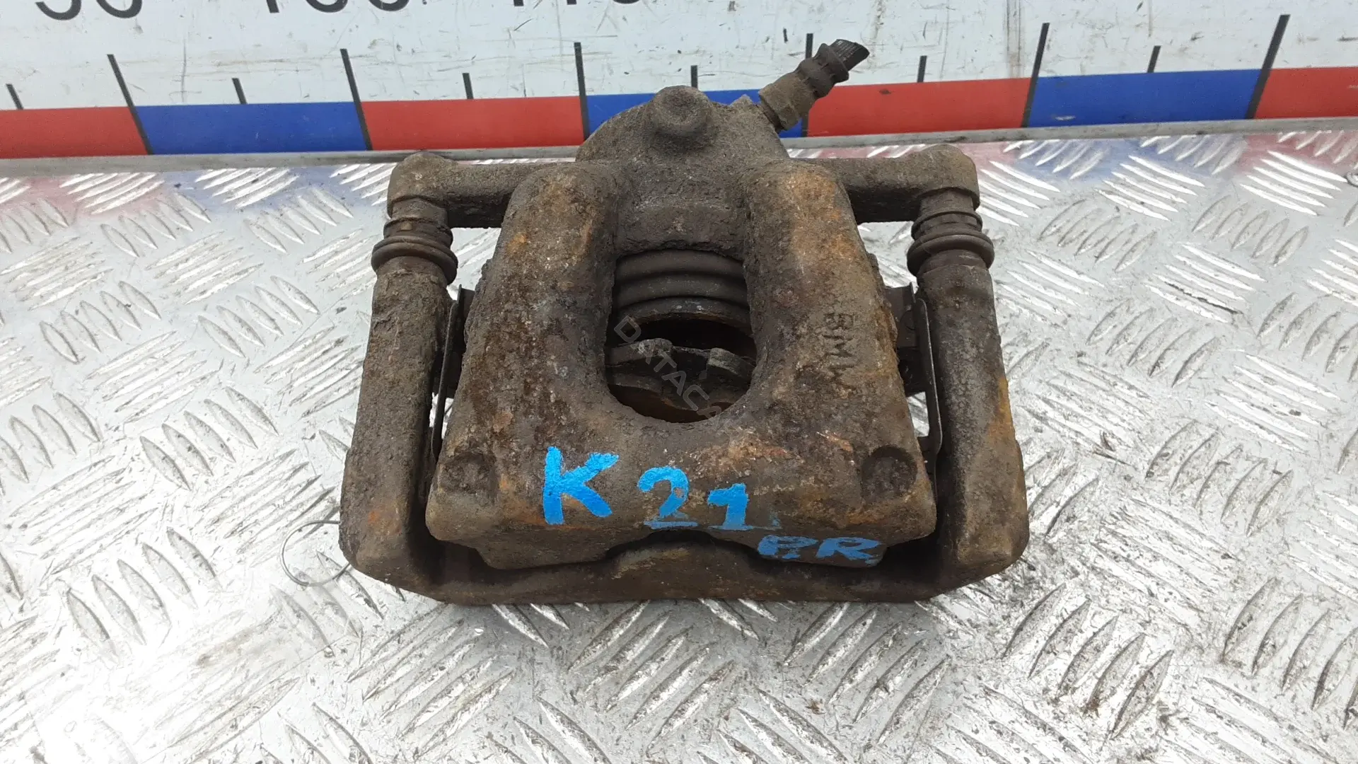 Суппорт тормозной 1KK21N701
