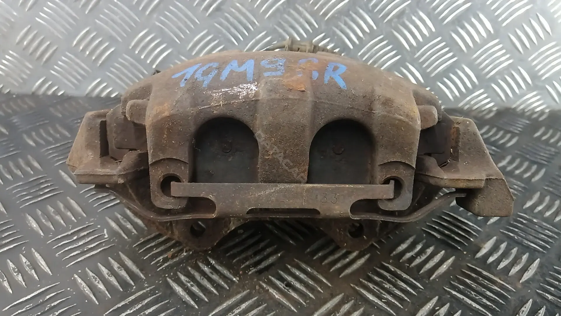Суппорт тормозной 1GM09N701