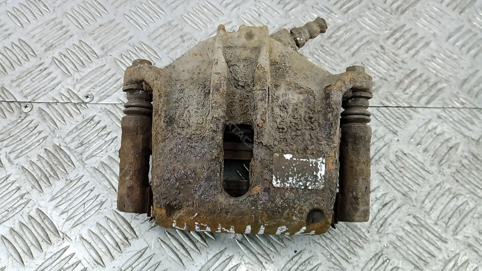 Суппорт тормозной UDN11K701