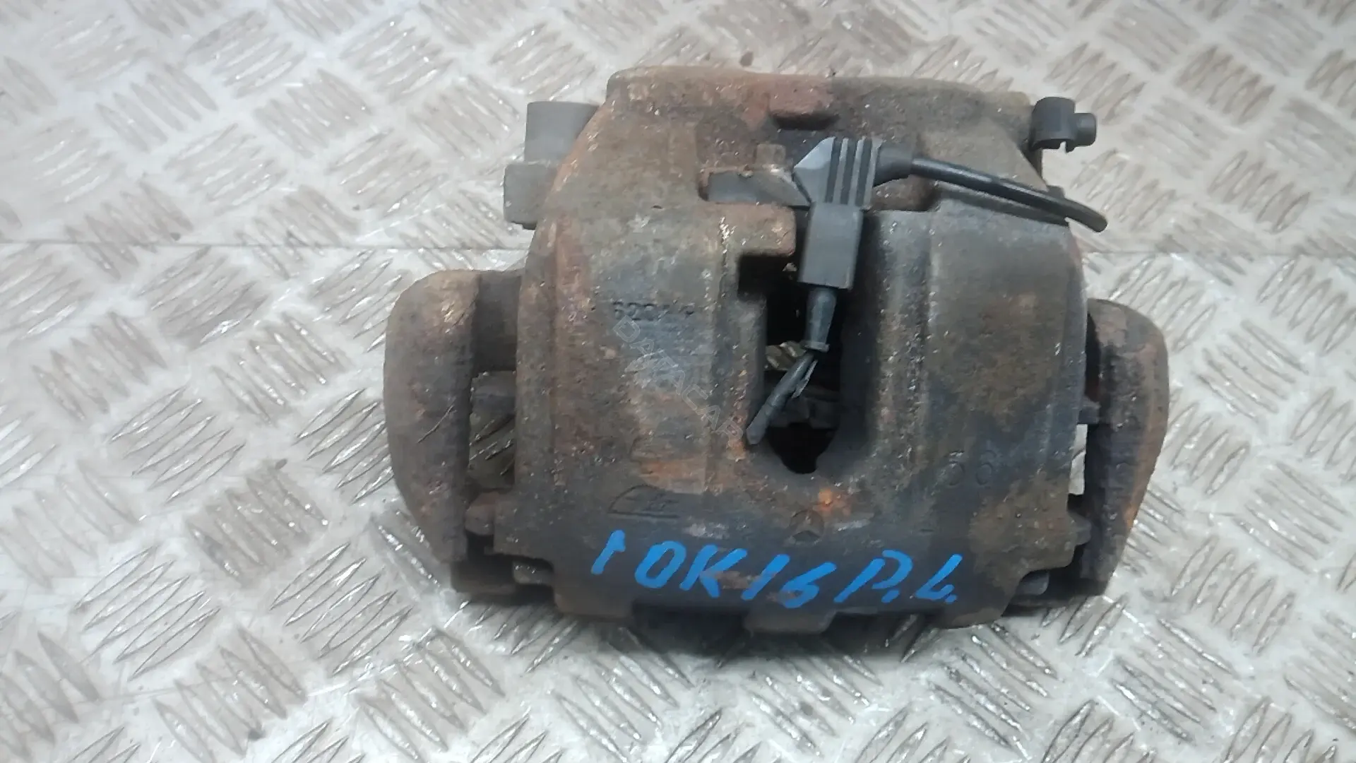 Суппорт тормозной 1OK16K701