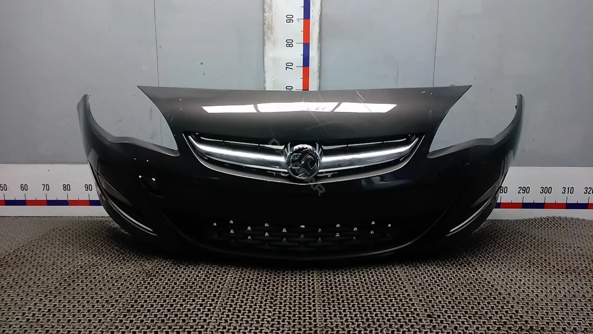 Передний бампер WOK43G501