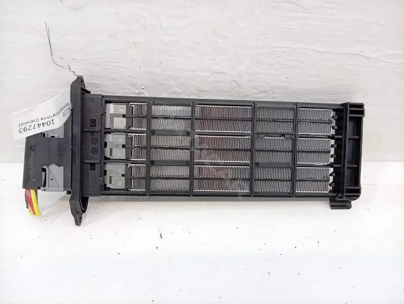 Радиатор печки T1001732A