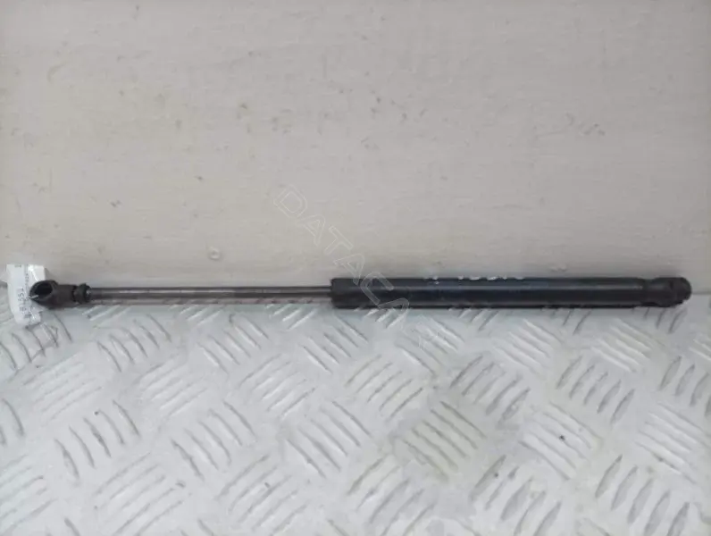 Амортизатор крышки багажника, капота, заднего стекла 1T0823359A