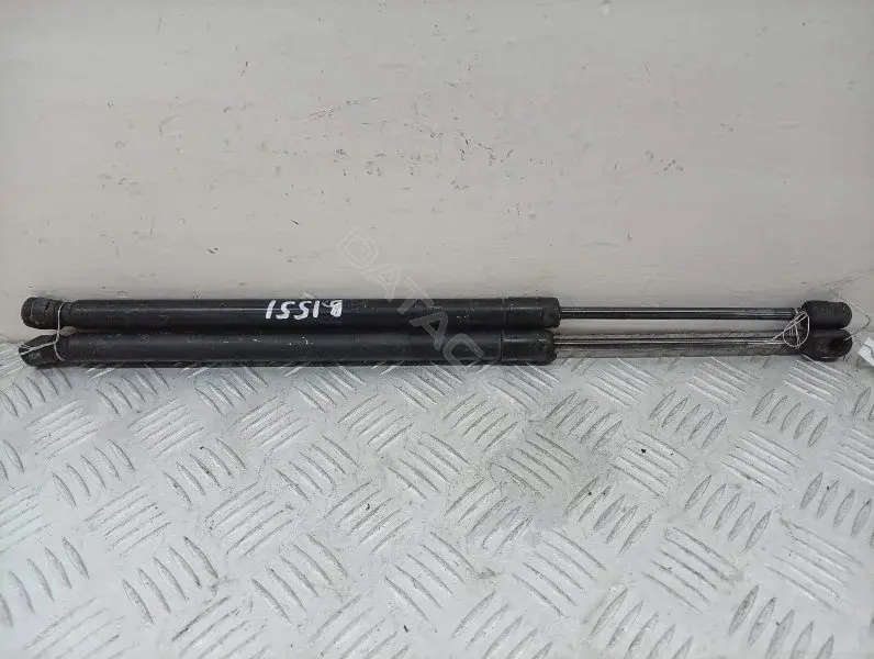 Амортизатор крышки багажника, капота, заднего стекла 1T0827550C