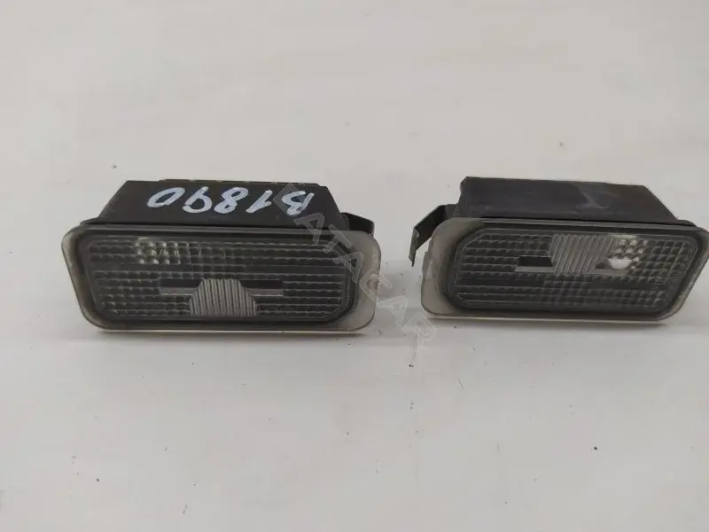 Фонарь подсветки номерного знака 10432582