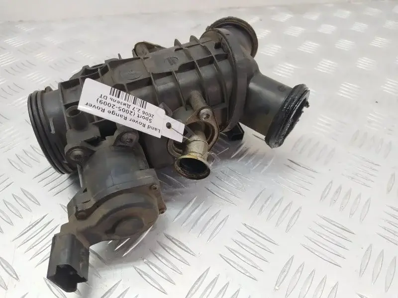 Дроссельная заслонка 4S7Q9L444CJ