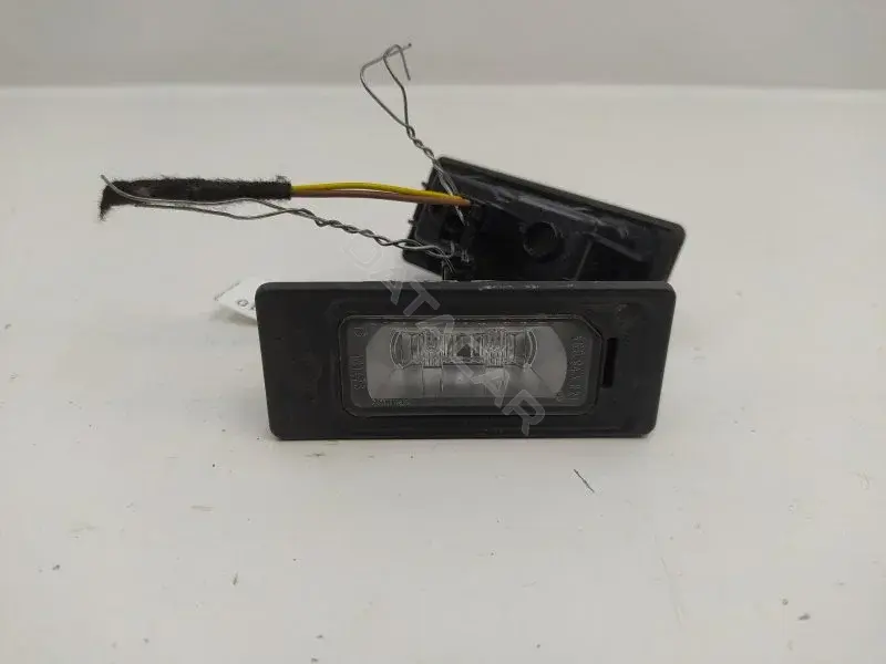 Фонарь подсветки номерного знака 4G0943021