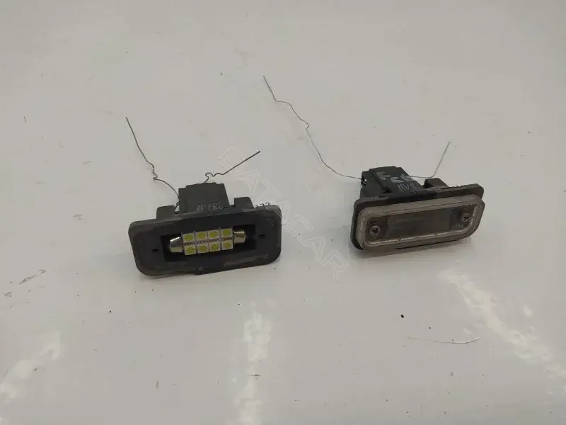 Фонарь подсветки номерного знака 10376132