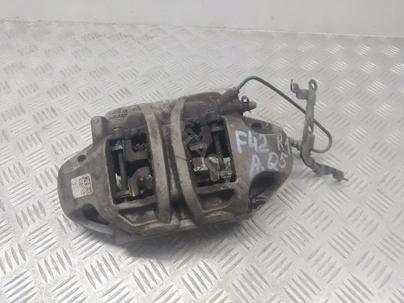 Суппорт тормозной 80A615106AB