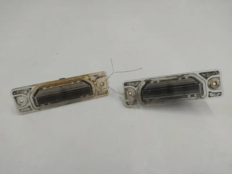 Фонарь подсветки номерного знака 26510JD00A