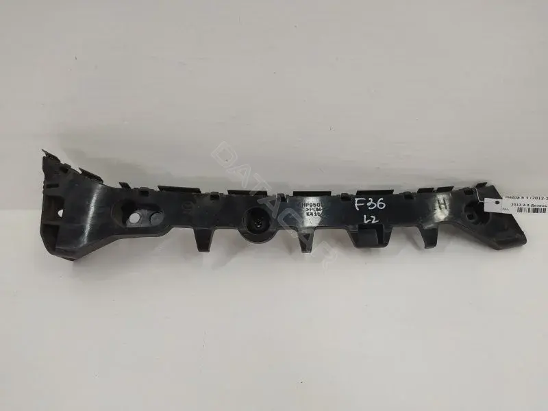 Кронштейн-направляющая бампера GHP9502J1