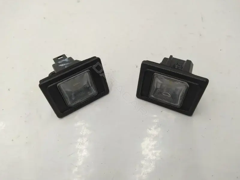 Фонарь подсветки номерного знака A0009062903