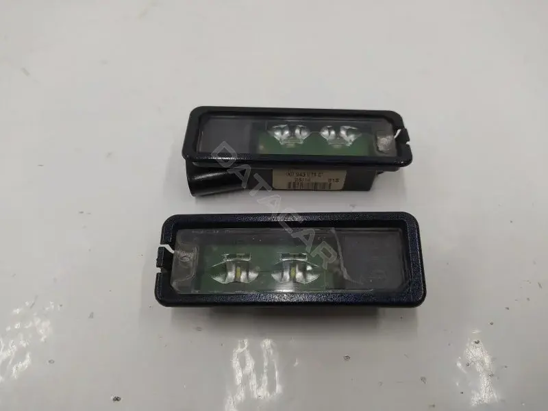 Фонарь подсветки номерного знака 1K8943021C