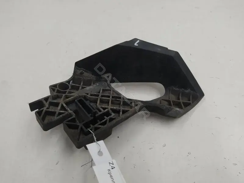 Кронштейн фары 6002TM0167