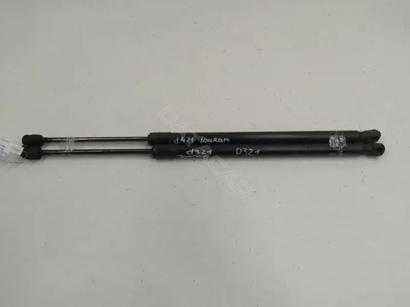 Амортизатор крышки багажника, капота, заднего стекла 1T0827550C