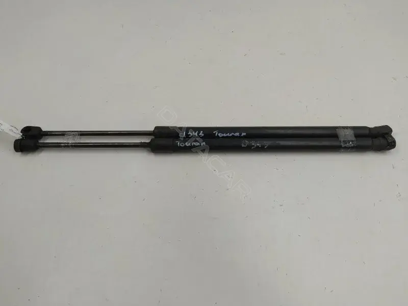 Амортизатор крышки багажника, капота, заднего стекла 1T0827550C