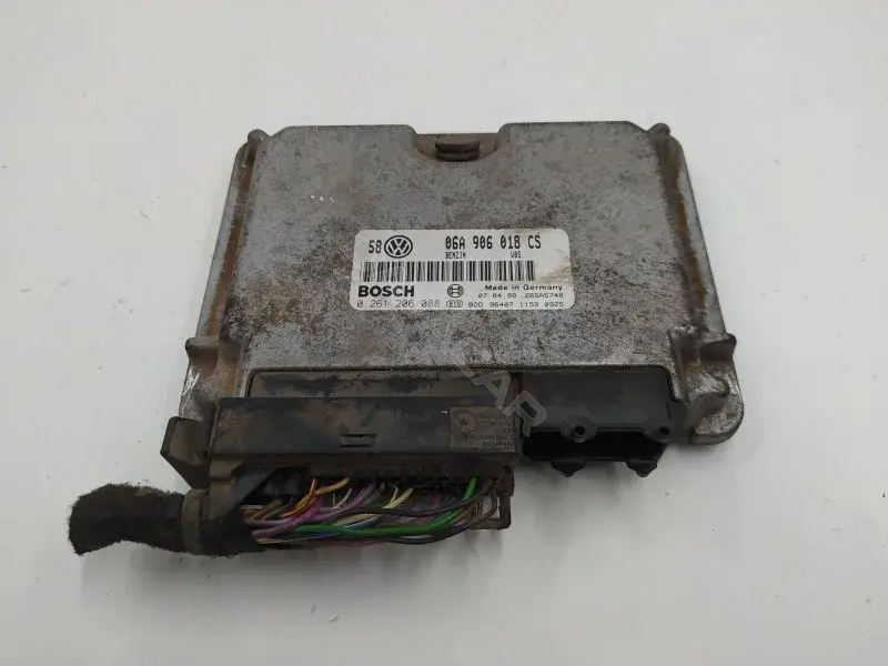 Блок управления двигателем 06A906018CS
