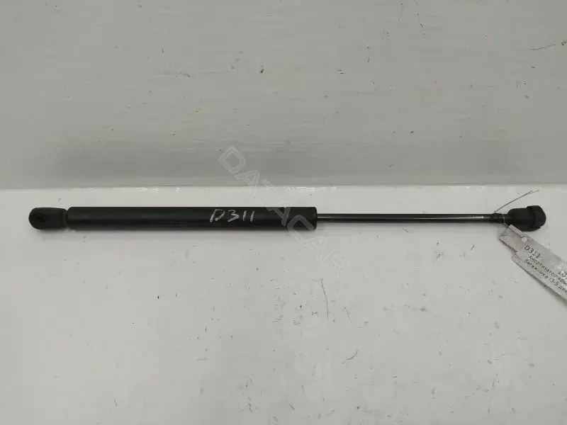 Амортизатор крышки багажника, капота, заднего стекла 1U9827550B