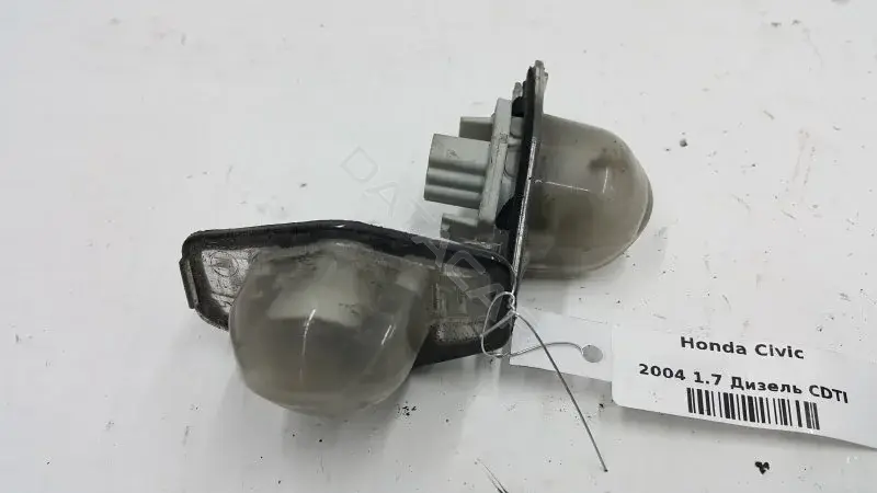 Фонарь подсветки номерного знака 10272210