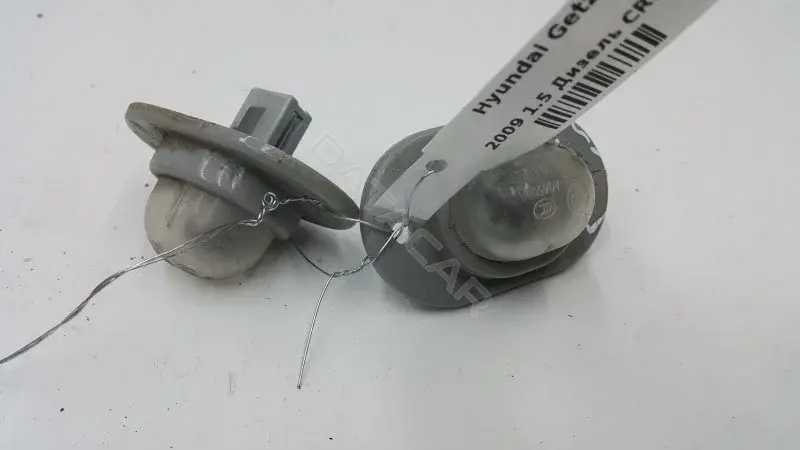 Фонарь подсветки номерного знака 92501296