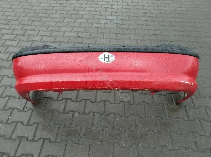 Задний бампер 10136730